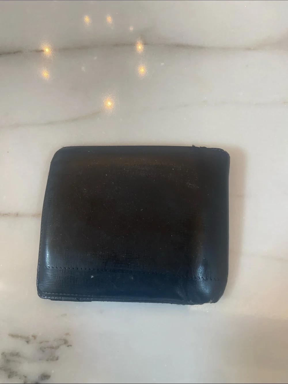 Prada Black Men’s Bifold Wallet with Metal Logo Plaque